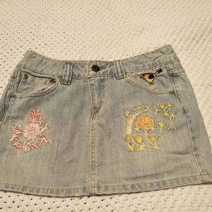 Someone embroidered flower/ bird jeans mini skirt